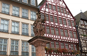 Prints of Gabled architecture and statue of Romerberg, Old Town, Frankfurt, Germany Images Dated 2027 October: Gabled architecture and statue of Romerberg, Old Town, Frankfurt, Germany