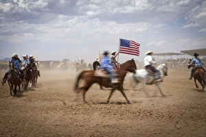 Galisteo, New Mexico, United States. Galisteo Rodeo, all entrants ride in the ring