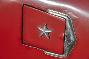 Prints of Detail of gasoline tank door with star on classic American car in Vieja, old Habana, Havana, Cuba Caribbean Prints: Detail of gasoline tank door with star on classic American car in Vieja, old Habana