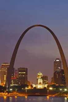 Images Dated 10th May 2011: The Gateway Arch and St Louis skyline reflect into the Mississippi River at dusk in St Louis