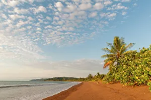 Away From It All Prints: Gentle surf surging onto the sandy beach at Drake Bay, Osa Peninsula, Costa Rica
