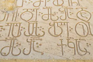 Images Dated 25th September 2014: Georgia, Kakheti. A closeup of carved stone characters at the David Gareja Monastery