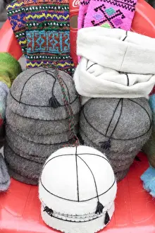 Images Dated 20th September 2014: Georgia, Mtskheta. A collection of traditional hats for sale as souveniers