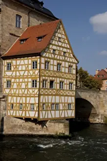 Germany, Bamberg. Historic 14th century Old Town Hall, built on the river Regnitz