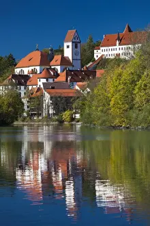 Images Dated 9th October 2014: Germany, Bavaria, Fussen, St. Mang Abbey and the Hohes Schloss Castle from the Lech River
