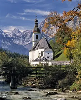 Foot Bridge Prints: Germany, Bavaria, Ramsau. The Ramsauer Ache flows by the church, or Kunterwegkirche