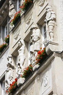 GERMANY, Bayern-Bavaria, Munich. Building Gargoyles on Kaufinger Strasse