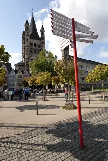 Cologne Prints: Germany, Cologne (aka Koln). Historic waterfront area with St. Martin church in distance