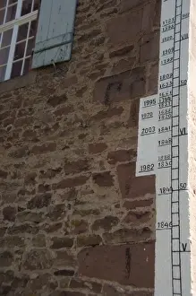 Wertheim Prints: Germany, Franconia, Wertheim. Historic flood water line markers along old wall
