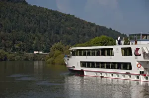 Images Dated 23rd September 2009: Germany, Franconia, Wertheim. Viking Legend riverboat cruising along