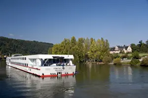 Riverfront Prints: Germany, Franconia, Wertheim. Viking Sky riverboat cruising along