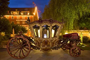 Germany, Lindau Island, Lake Constance. Victorian ornate carriage in front of hotel