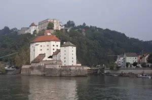 Riverfront Prints: Germany, Passau. Confluence of Danube & Ilz rivers in front of the historic Veste