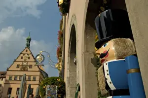 Images Dated 22nd September 2009: Germany, Rothenburg. Market Square (aka Marktplatz), Giant nut-cracker with City