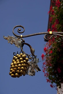 Hang Prints: Germany, Rothenburg. Traditional hanging sign, Franconian grapes in front of famous