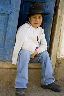 Images Dated 9th May 2005: Girl sitting in doorway, Huaripampa (near Huaraz), Peru. (MR)