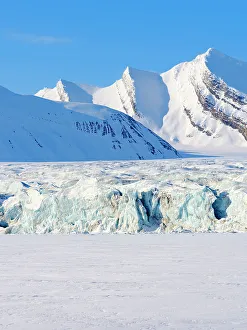 Icefall Prints: Glacier front of Fridtjovbreen and the frozen fjord Van Mijenfjorden