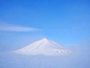 Lonely Prints: Glacier Rabotbreen and Nunatak Kopingfjellet in Sassen-Buensow Land National Park