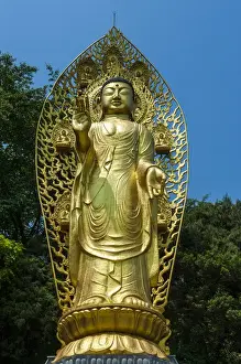 Golden buddha in the Unesco world heritage sight the fortress of Suwon, South Korea