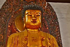 Images Dated 12th September 2013: Golden and colorful Buddas at the Jade Buddha Temple in Shanghai, China