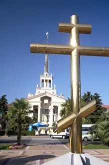 Eastern Orthodox Prints: Golden cross of the Russian Orthodox Church at park in front of the Harbor Building