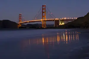 Jim Goldstein Prints: The Golden Gate Bridget at dusk reflected in the sands of Baker Beach, San Francisco