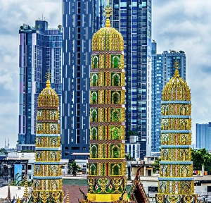 Prints of Golden Three Towers, Wat Khun Chan, Bangkok, Thailand. Temple established in early 1800's Images Dated 2024 December: Golden Three Towers, Wat Khun Chan