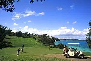 Golfing at the wonderful colorful Castle Harbour Course in Bermuda vacation holiday