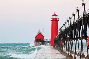 Trending: Grand Haven South Pier Lighthouse at sunrise on Lake Michigan, Ottawa County, Grand Haven