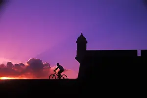 Images Dated 2003: Graphic colorful sunset bike ride at El Morro Fort in Old San Juan, Puerto Rico