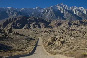 Gravel Prints: Gravel Road leading towards the Eastern Sierra Mountains in the Alabama Hills of California
