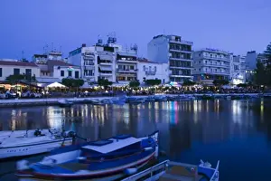 Restuarant Prints: GREECE-CRETE-Lasithi Province-Agios Nikolaos: View of the Cafes by Voulismeni Lake / Dusk