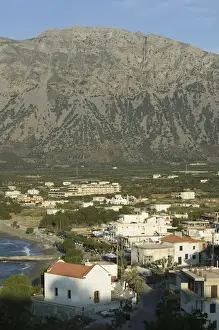 Lasithi Province Prints: GREECE-CRETE-Lasithi Province-Pachia Ammos: Coastal Village View and Mt. Orno / Late