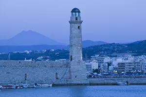 Images Dated 29th May 2006: GREECE-CRETE-Rethymno Province-Rethymno: Venetian Harbor with lighthouse / Dusk