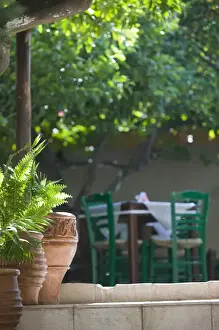 Images Dated 29th May 2006: GREECE-CRETE-Rethymno Province-Rethymno: Old Quarter- Cafe Table