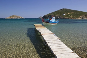 Images Dated 17th May 2006: GREECE, Dodecanese Islands, PATMOS, Kampos: Shore view with small boat / Livadi Geranos
