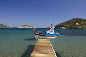 Images Dated 17th May 2006: GREECE, Dodecanese Islands, PATMOS, Kampos: Shore view with small boat / Livadi Geranos