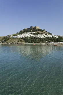 GREECE-Dodecanese Islands-RHODES-Lindos: Lindos Harbor- Beach View with Acropolis