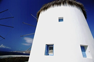 Greece, EU, Aegean Sea, Mykonos. Typical landmark seaside windmills