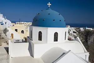 Greece and Greek Island of Santorini from the small town of Imerovigli with blue