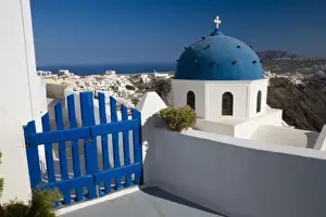 Greece and Greek Island of Santorini from the small town of Imerovigli with blue