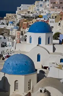 Images Dated 15th September 2007: Greece and Greek Island of Santorini town of Oia with Blue Domed Churches with white