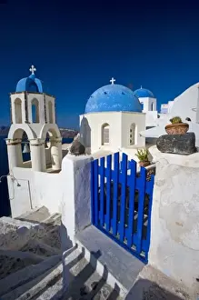Images Dated 15th September 2007: Greece and Greek Island of Santorini town of Oia with Blue Domed Churches with white