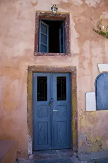 Door Way Prints: Greece and Greek Island of Santorini town of Oia with blue doorway and blue shuttered