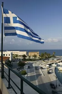 Images Dated 3rd May 2006: GREECE, Ionian Islands, ZAKYNTHOS: Greek Flag & Town Waterfront