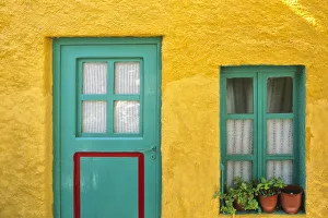 Images Dated 13th September 2018: Greece, Nissyros. Door and window of colorful house
