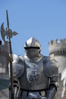 Images Dated 22nd May 2019: Greece, Rhodes. Medieval Old Town (UNESCO). Suit of armor with Palace of the Grand Master