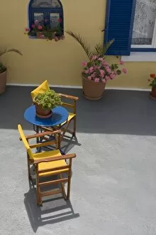 Greece, Santorini. Colorful patio and furniture