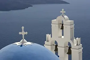 Greek Orthodox Prints: Greece, Santorini. Greek Orthodox church and white bell tower overlooking the Aegean Sea