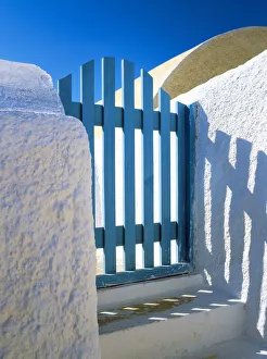 Greece, Santorini, Oia. Blue gate of home. Credit as: Jim Nilsen / Jaynes Gallery / DanitaDelimont